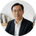 球迷社区用户头像，中年男性戴眼镜，学术气质